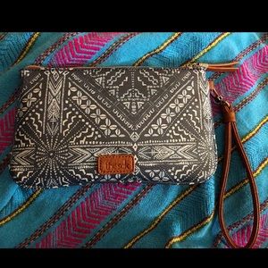 The Sak portable CHARGING wristlet